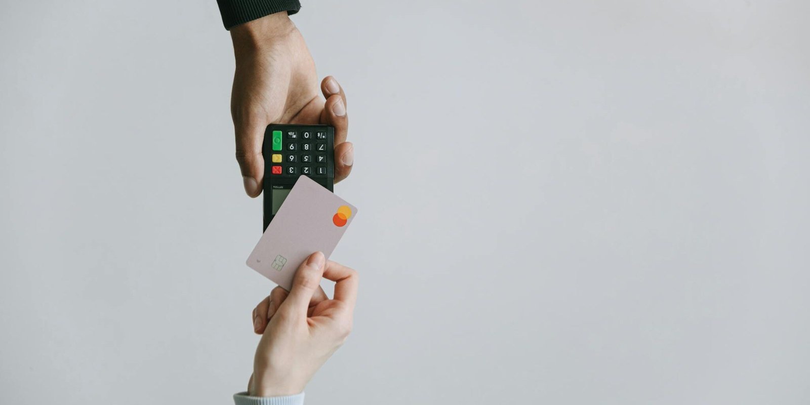 Photo by Ivan Samkov Modern contactless payment using a card and terminal, highlighting the ease of digital transactions.